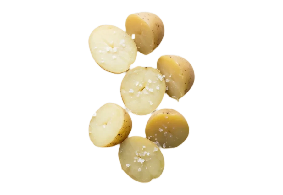 Halved boiled baby potatoes with flaky salt.